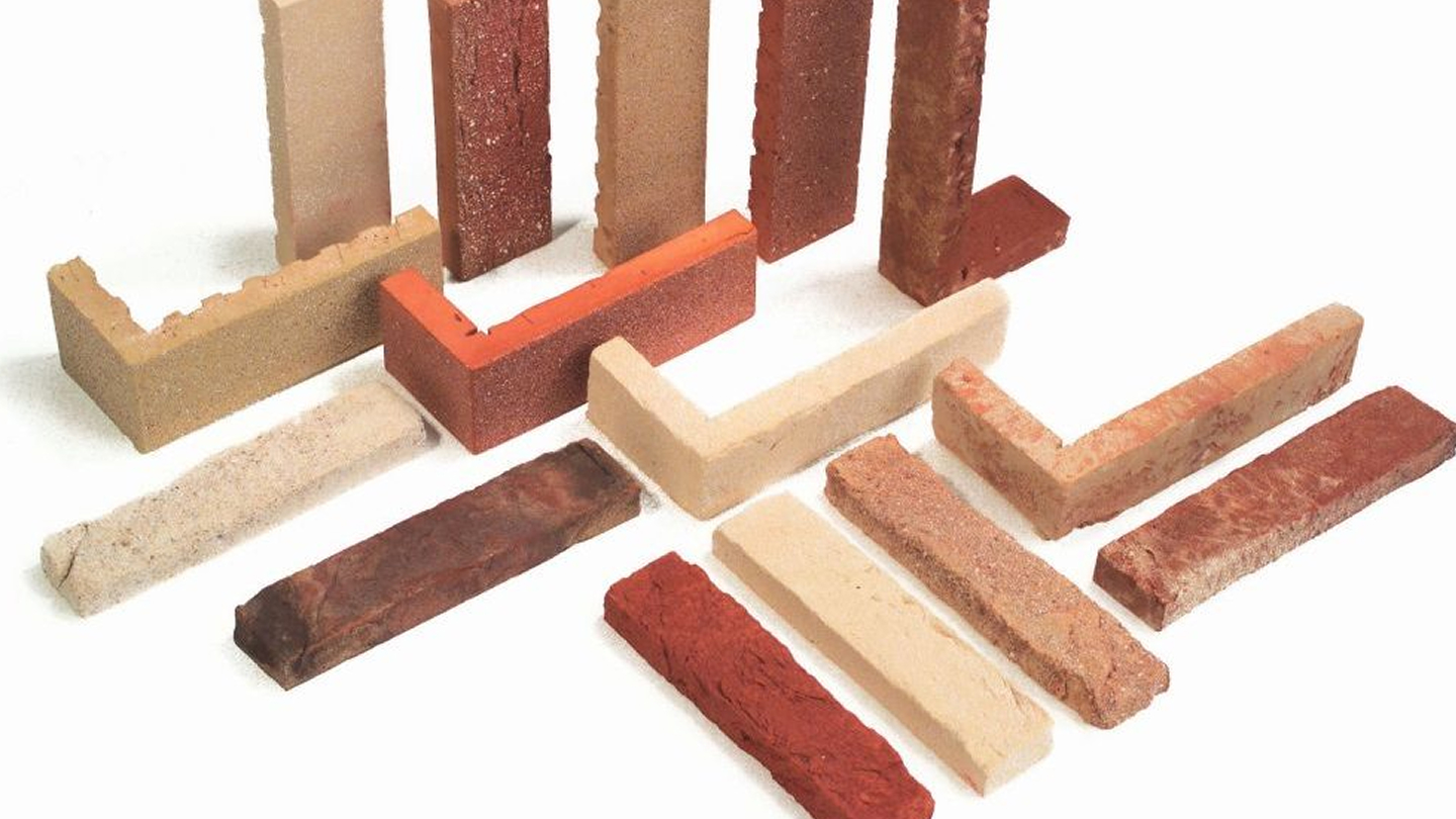 We cut Belgian/Dutch, aged clay bricks into corners and tiles.